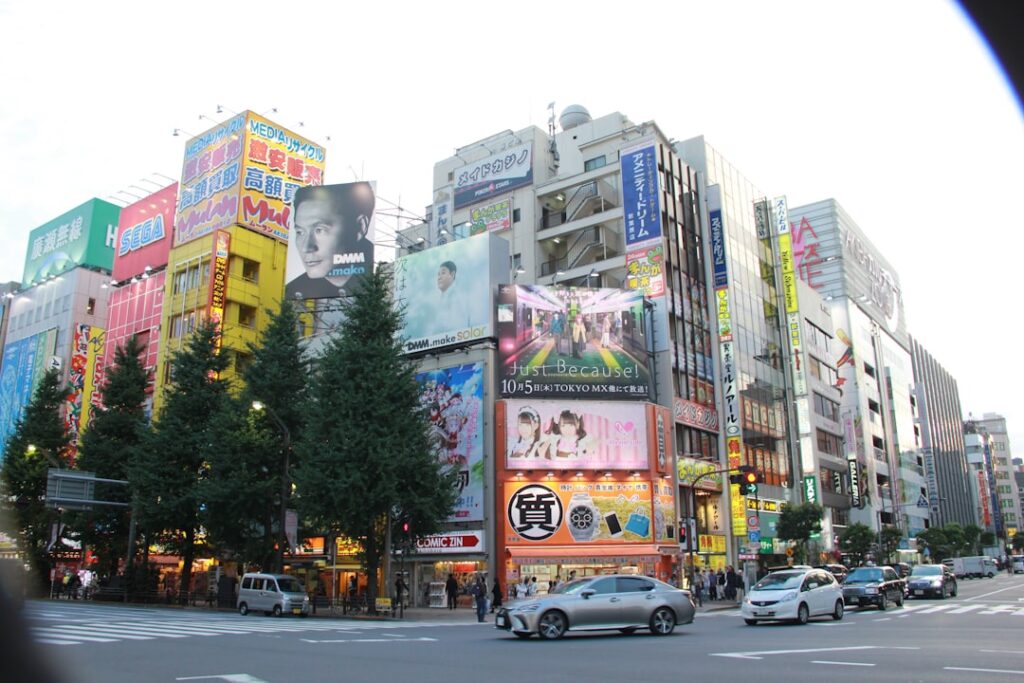 Colorful buildings with advertisements in a city street.